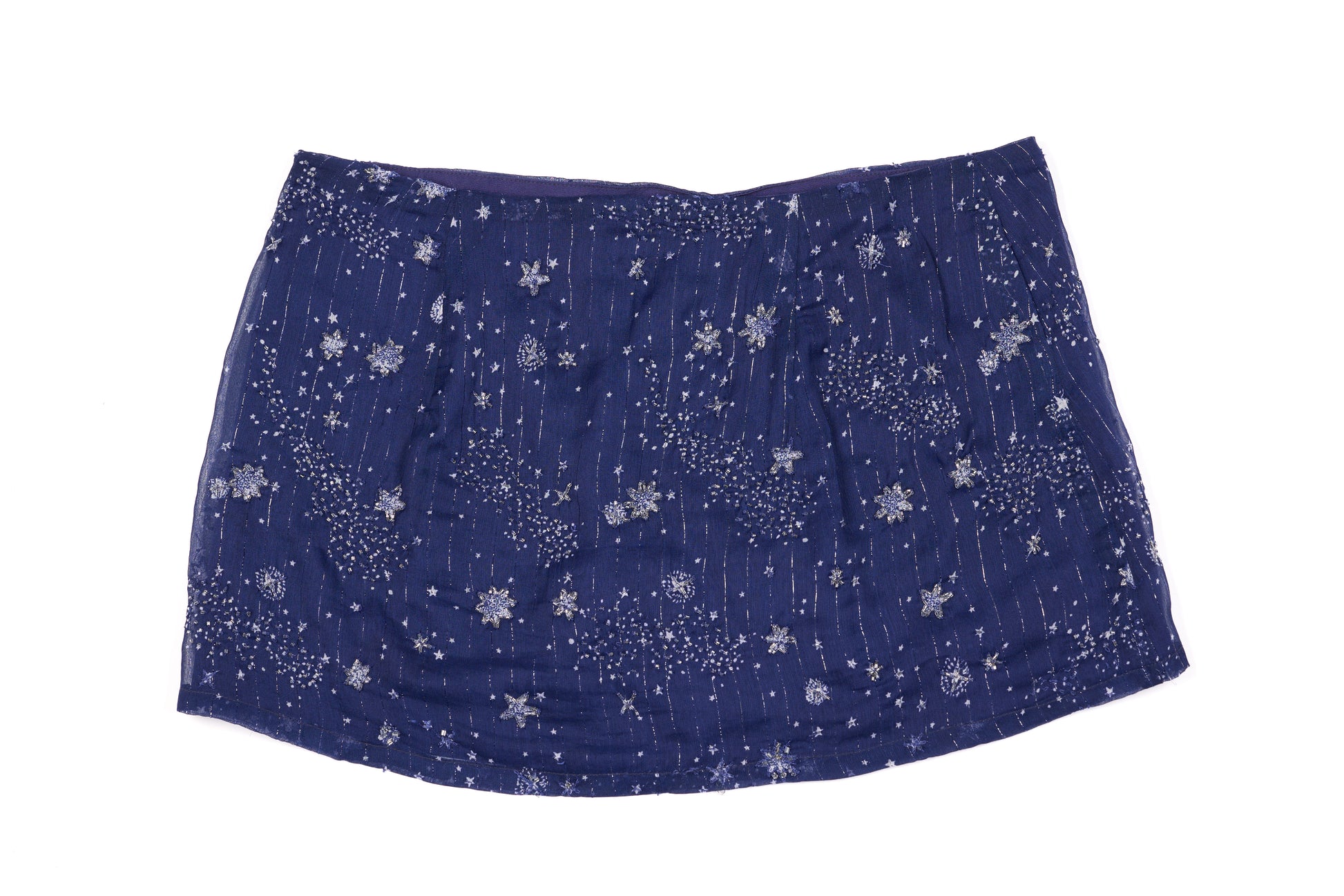 Navy blue skirt with white floral pattern on a white background