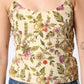 Floral patterned tank top worn by a person with a neutral background