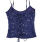 Purple star-patterned top on a white background