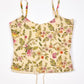 Floral patterned crop top on a white background